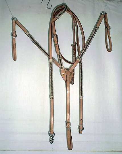 Feb08_16-1.jpg - Matching Bridle ,reins & breastplate decorated with braided knots and horse hair (the horse hair is no longer available)